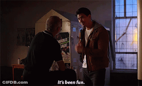 A Man Talking To Another Man In Front Of A Locker With A Poster That Says " It 'S Been Fun " On It GIF