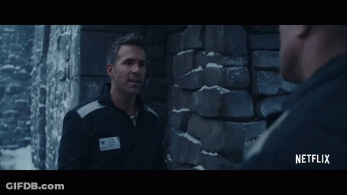 A Man Talking To Another Man With A Netflix Logo On The Bottom GIF