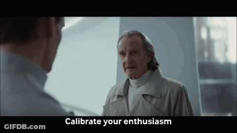 Man Talking To Another With Calibrate Your Enthusiasm Text GIF