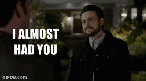 A Man Talking To Another Man With The Words I Almost Had You GIF