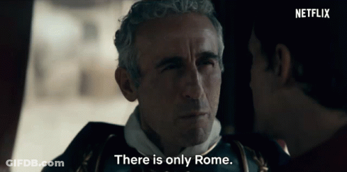 A Man Talking To Another Man With The Words " There Is Only Rome " GIF