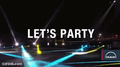 A Man Truck Is Driving Down The Road At Night GIF