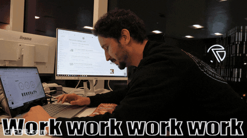 A Man Typing On A Laptop With The Words Work Work Work Work Written Below Him GIF