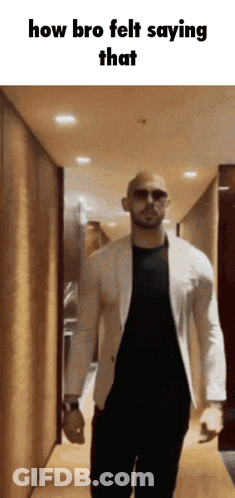 A Man Walking Down A Hallway With The Words How Bro Felt Saying That GIF