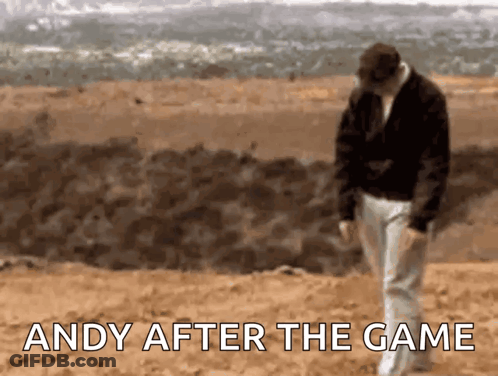 A Man Walking In The Sand With The Words " Andy After The Game " Written Below Him GIF