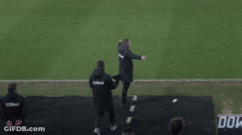 A Man Walking On A Soccer Field Wearing A Shirt That Says ' Do ' On It GIF