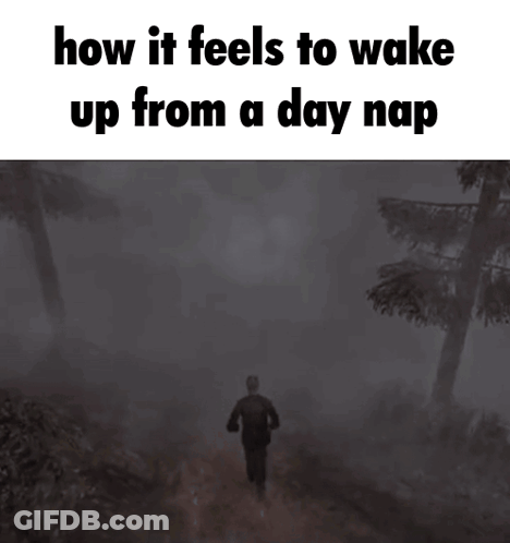 A Man Walking Through A Foggy Forest With The Words " How It Feels To Wake Up From A Day Nap " GIF