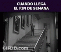 A Man Walking Up A Set Of Stairs With The Words Cuando Llega El Fin De Semana GIF