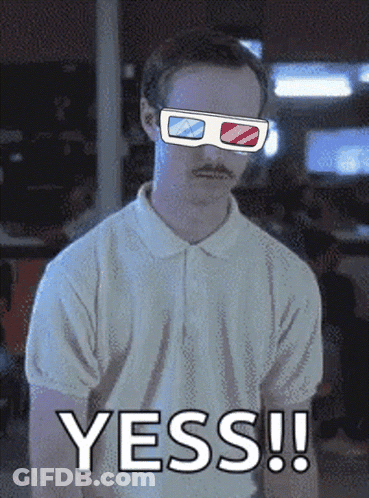 A Man Wearing 3D Glasses Has The Word Yess Written Below Him GIF