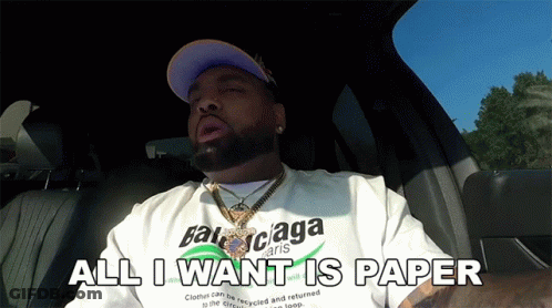 A Man Wearing A Balenciaga Shirt Is Sitting In A Car And Saying All I Want Is Paper GIF