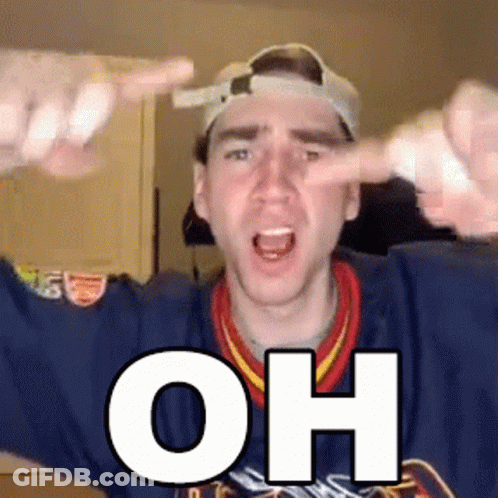 A Man Wearing A Baseball Cap And A Blue Sweater With The Word Oh On It GIF