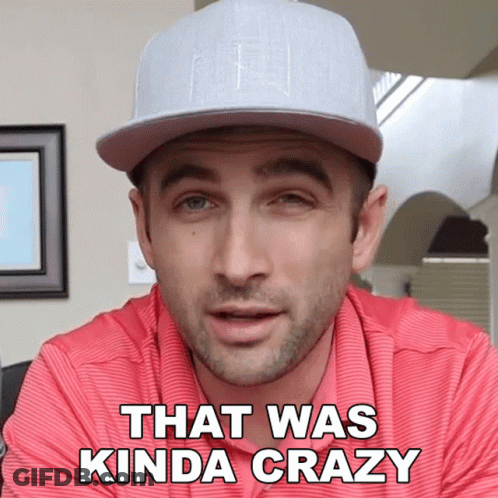 A Man Wearing A Baseball Cap And A Red Shirt Says That Was Kinda Crazy GIF