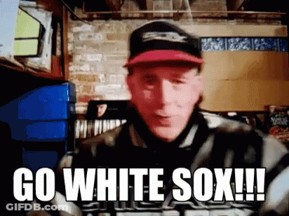 A Man Wearing A Baseball Cap And Jacket Says Go White Sox !!! GIF