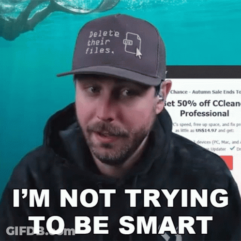 A Man Wearing A Baseball Cap That Says Delete Their Files GIF