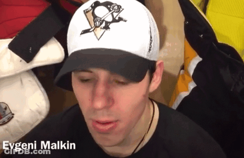 A Man Wearing A Baseball Cap With The Name Evgeni Malkin On It GIF