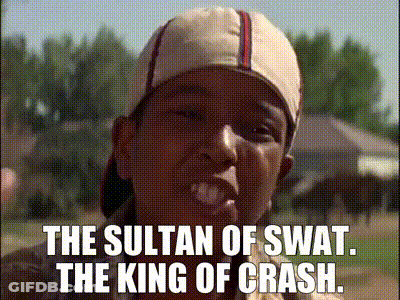 A Man Wearing A Baseball Cap With The Words The Sultan Of Swat The King Of Crash Written On It GIF