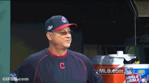 A Man Wearing A Baseball Uniform With The Letter C On The Front GIF