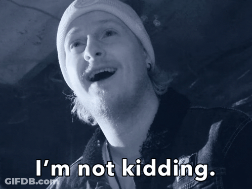 A Man Wearing A Beanie And A Denim Jacket Says " I 'M Not Kidding " GIF