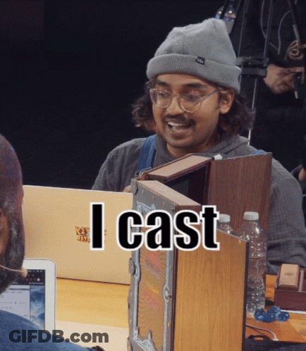 A Man Wearing A Beanie And Glasses Is Holding A Book And The Words I Cast Are Above Him GIF
