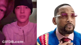 A Man Wearing A Beanie And Sunglasses Next To A Man Wearing A Tie And Sweater . GIF