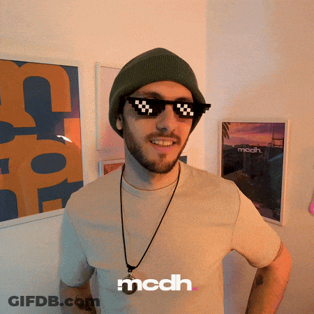 A Man Wearing A Beanie And Sunglasses With The Word Mcdh On The Bottom Right GIF
