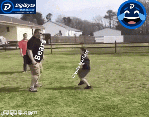 A Man Wearing A Bears Shirt Stands Next To A Boy Wearing A Crypto Market Shirt GIF