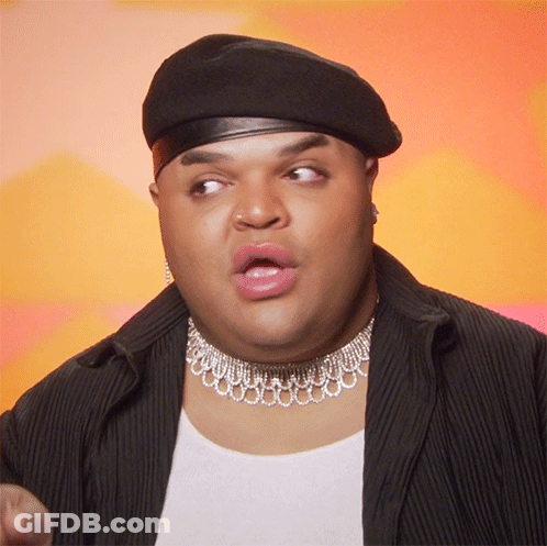 Man Wearing Beret And Choker Making Funny Face GIF
