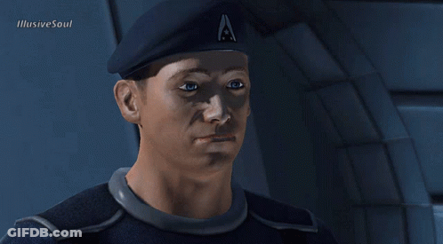 A Man Wearing A Beret With The Letter A On It Looks At The Camera GIF