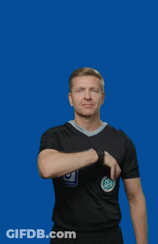 A Man Wearing A Black Adidas Shirt Holds Up A Yellow Card GIF