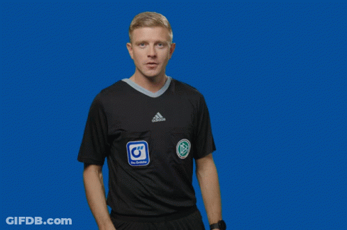 A Man Wearing A Black Adidas Shirt Holds Up His Hands GIF
