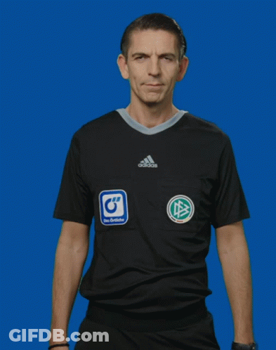 A Man Wearing A Black Adidas Shirt Makes A Funny Face GIF