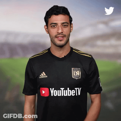 A Man Wearing A Black Adidas Shirt With Youtube Tv Written On It GIF