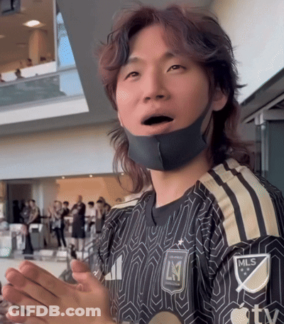 A Man Wearing A Black And Gold Mls Jersey GIF