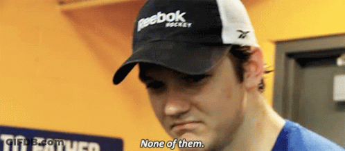 A Man Wearing A Black And White Reebok Hat Says None Of Them GIF