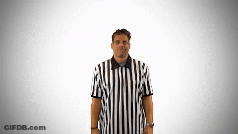 A Man Wearing A Black And White Striped Referee Shirt GIF
