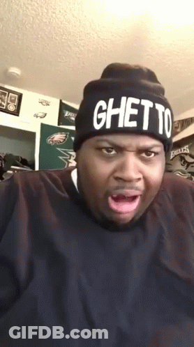 A Man Wearing A Black Beanie That Says Ghetto GIF