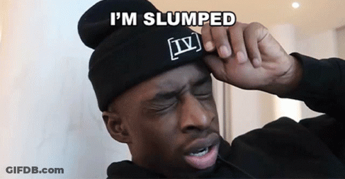 A Man Wearing A Black Beanie With Iv On It GIF
