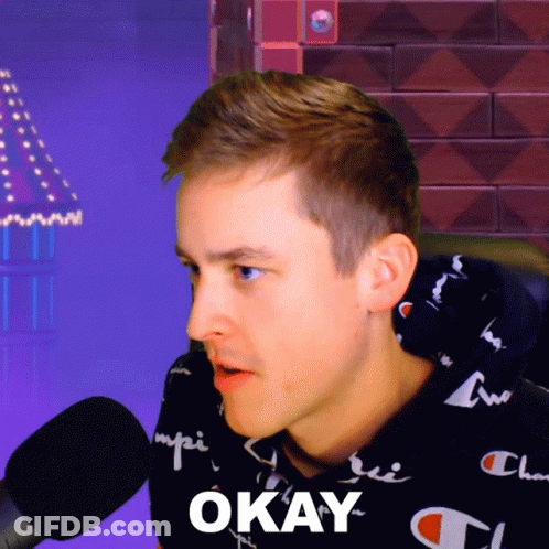 A Man Wearing A Black Champion Sweatshirt Says Okay GIF