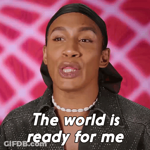 A Man Wearing A Black Hat And A Pearl Necklace Says The World Is Ready For Me GIF