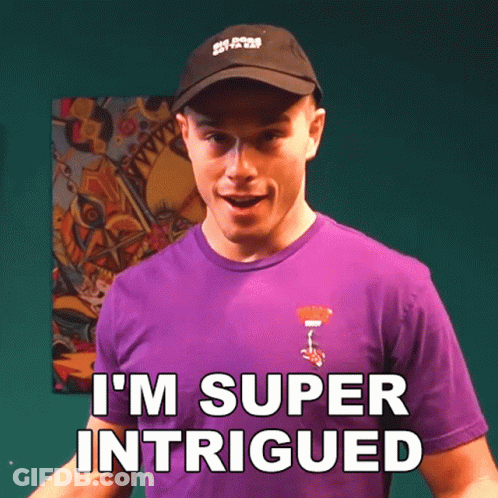 A Man Wearing A Black Hat And A Purple Shirt Says I 'M Super Intrigued GIF