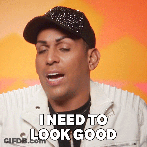 A Man Wearing A Black Hat And A White Jacket Says I Need To Look Good GIF