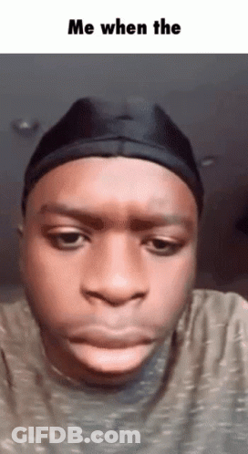 A Man Wearing A Black Hat Is Making A Funny Face With The Words Me When The Below Him GIF