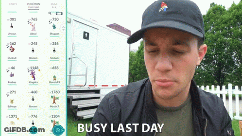 A Man Wearing A Black Hat Says Busy Last Day In Front Of A White Trailer GIF