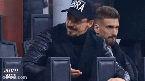 A Man Wearing A Black Hat That Says Ibra On It GIF