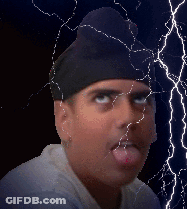 A Man Wearing A Black Hat With Lightning Behind Him GIF