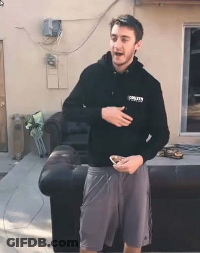 A Man Wearing A Black Hoodie That Says " Collett " GIF