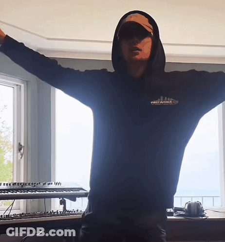 A Man Wearing A Black Hoodie That Says First Avenue On It GIF