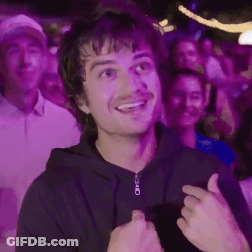 A Man Wearing A Black Hoodie With A Zipper That Says O On It GIF