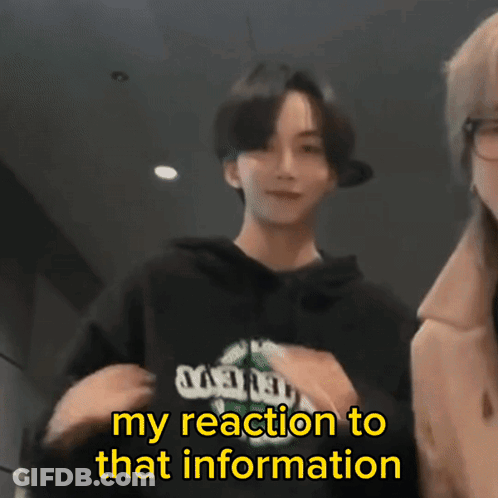 A Man Wearing A Black Hoodie With The Words " My Reaction To That Information " Below Him GIF