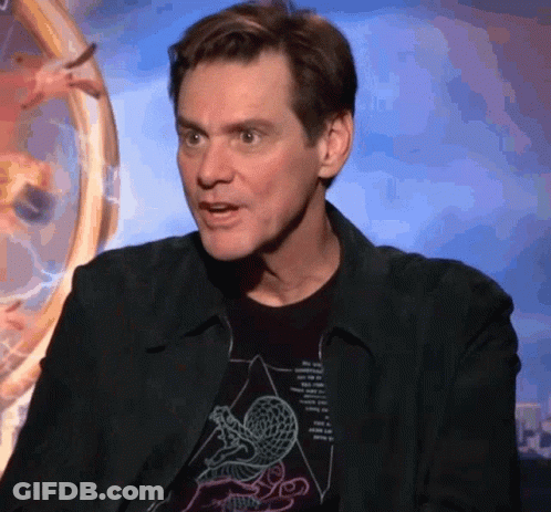 A Man Wearing A Black Jacket And A Black T-Shirt With A Drawing Of A Snake On It GIF